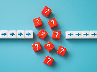 arrows pointing in one direction interrupted by question marks